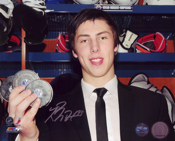 Ryan Nugent Hopkins Autographed Edmonton Oilers 1st NHL Hat Trick Pucks 16x20 Photo